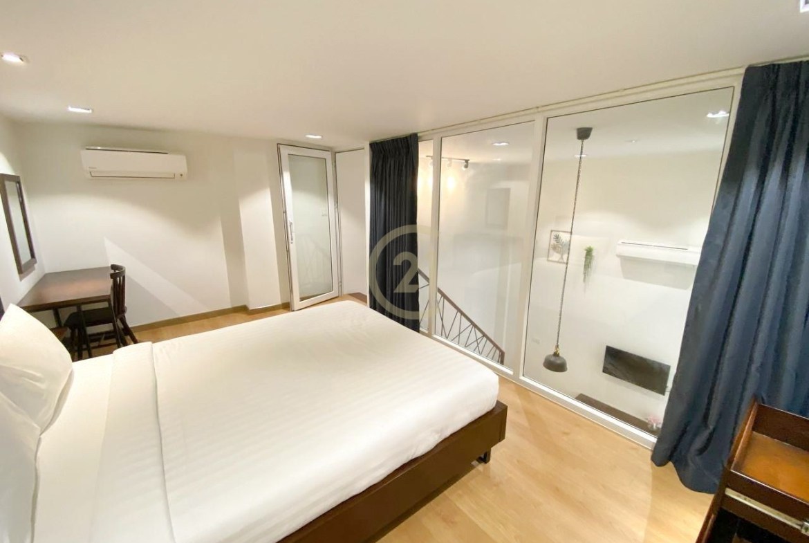 Modern Duplex 1BR with Pool & Rooftop Garden
