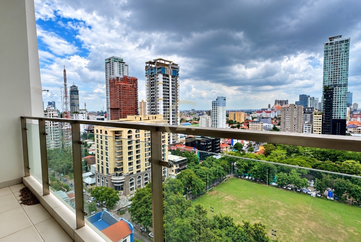 Embassy Central BKK1 condo balcony overlooking the school playing field and green belt in Phnom Penh